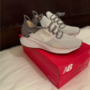 New Balance Woman’s Gray and White Sneakers